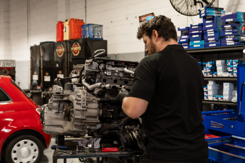 Brisbane car service Brisbane - qualified technician performing logbook service